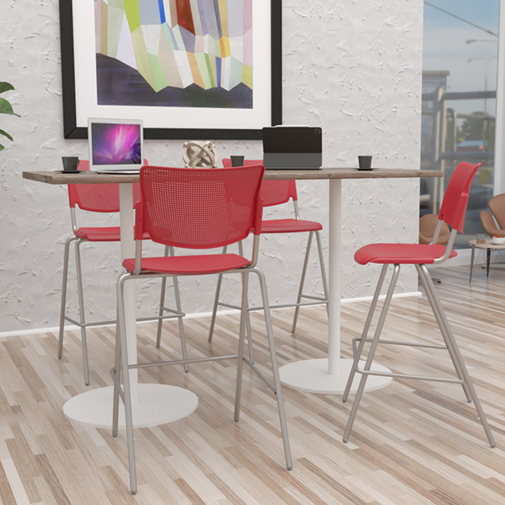 bar height stools in red in a corporate break room