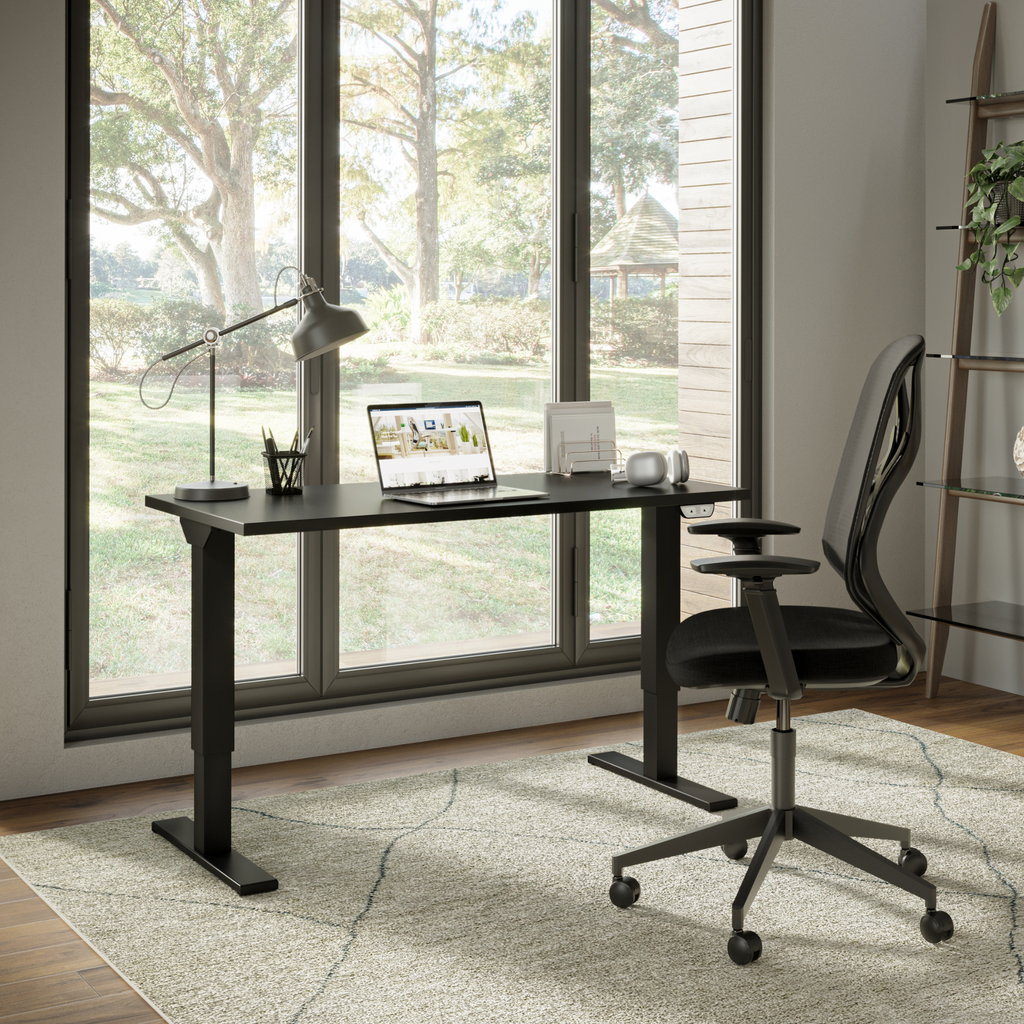 Essential Desk Lifestyle Image. Black Desk legs and black top.