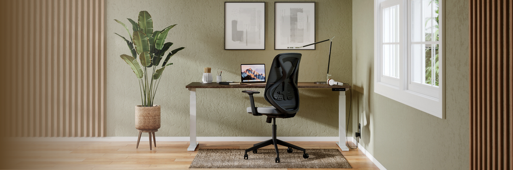 Driftwood Desk with White Height Adjustable Legs and a black chair in a living room office
