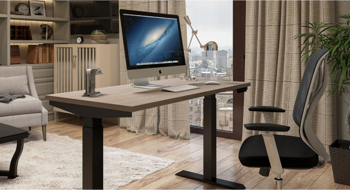 Height-adjustable office desk in a home office